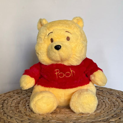 Peluche que respira Winnie the Pooh con canciones de cuna