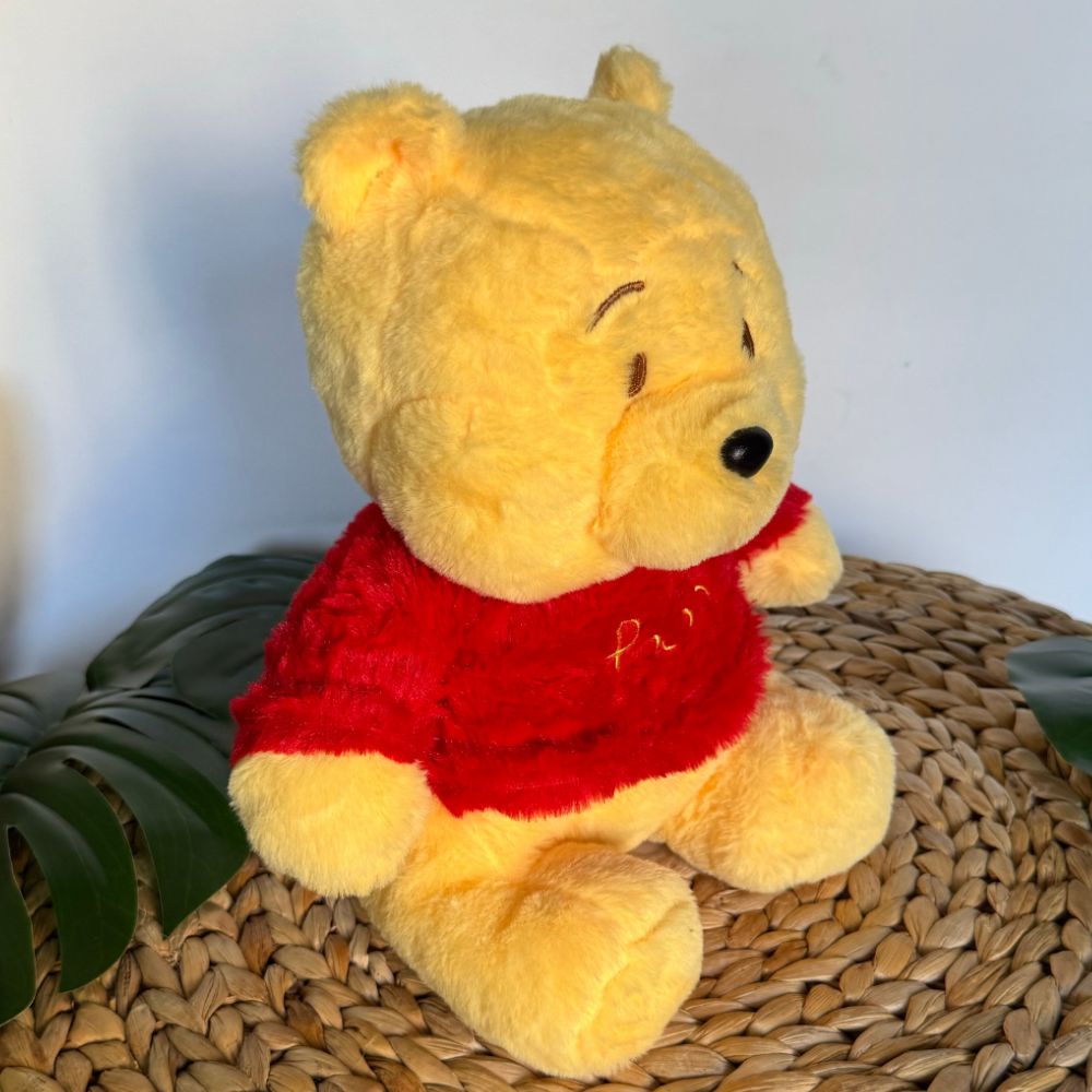 Peluche que respira Winnie the Pooh con canciones de cuna