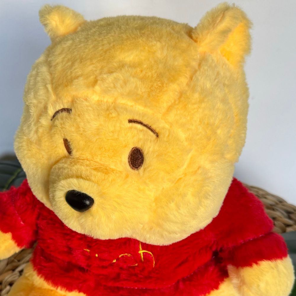 Peluche que respira Winnie the Pooh con canciones de cuna