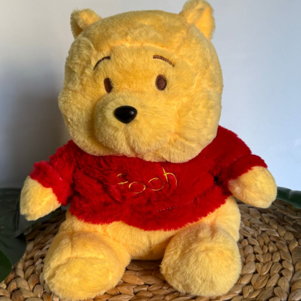 Peluche que respira Winnie the Pooh con canciones de cuna