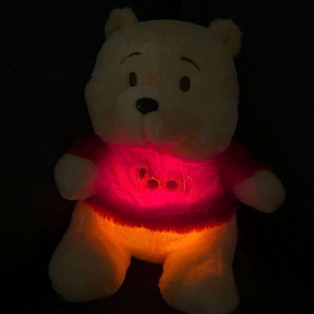 Peluche que respira Winnie the Pooh con canciones de cuna