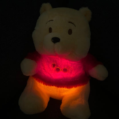 Peluche que respira Winnie the Pooh con canciones de cuna